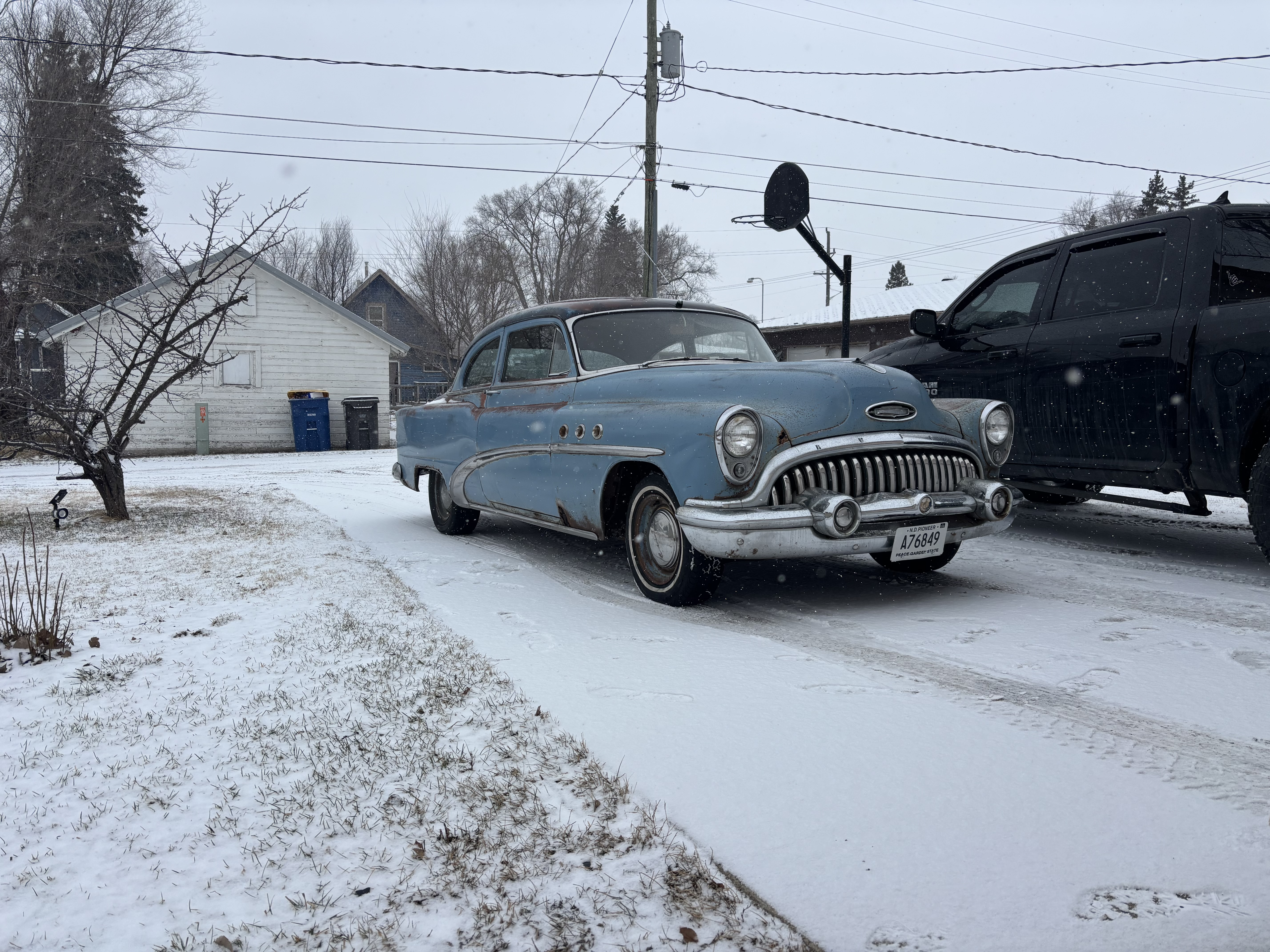 Buick in friends driveway